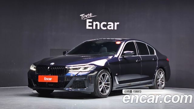 BMW 5-Series 2023 — photo 1