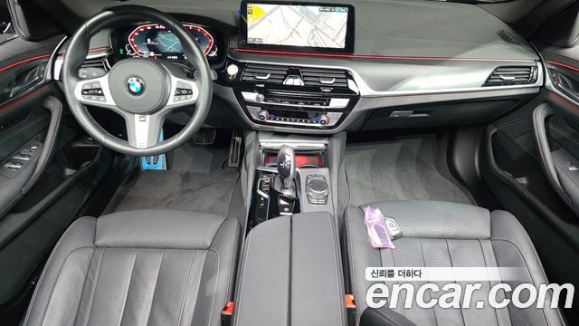 BMW 5-Series 2023 — photo 10