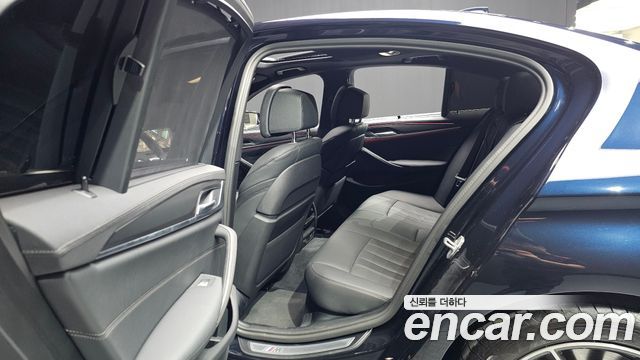 BMW 5-Series 2023 — photo 17