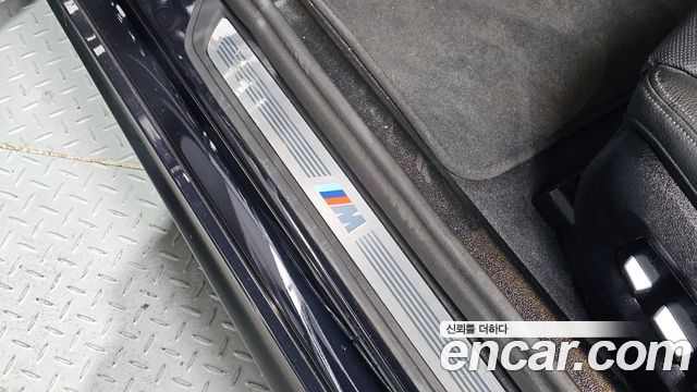 BMW 5-Series 2023 — photo 19