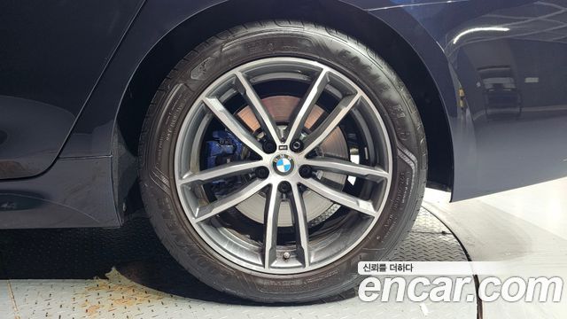 BMW 5-Series 2023 — photo 7