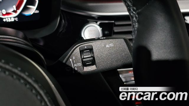 BMW 5-Series 2023 — photo 28