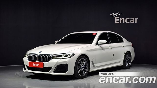 BMW 5-Series 2022 — photo 1