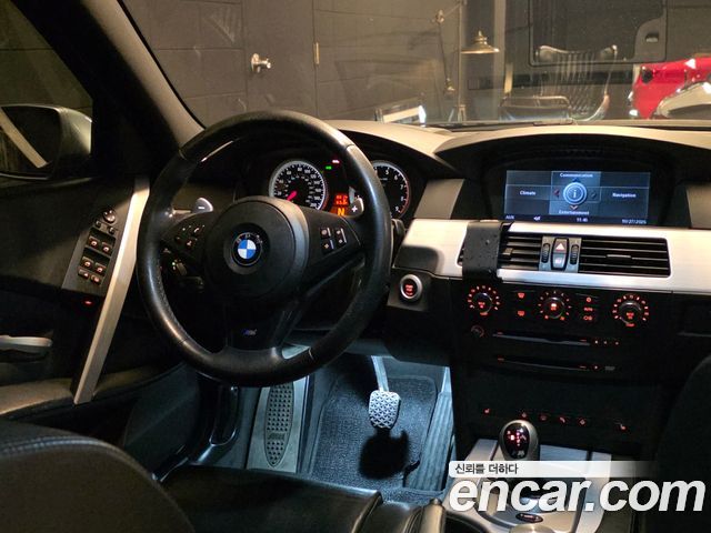 BMW M5 2006 — photo 7
