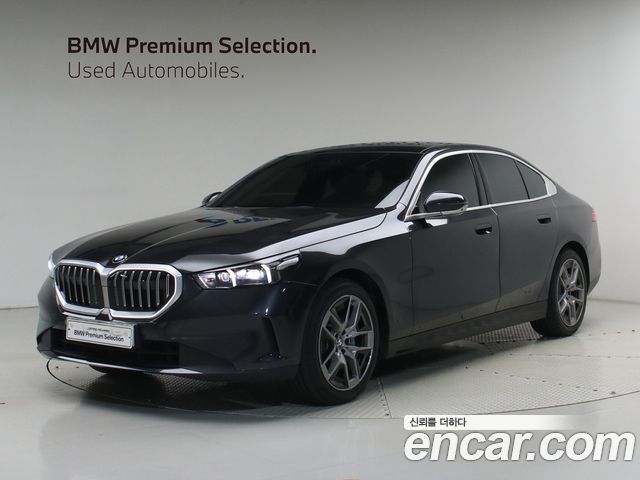 BMW 5-Series 2024 — photo 1