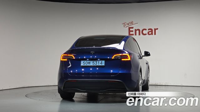 Tesla Model Y 2024 — photo 4