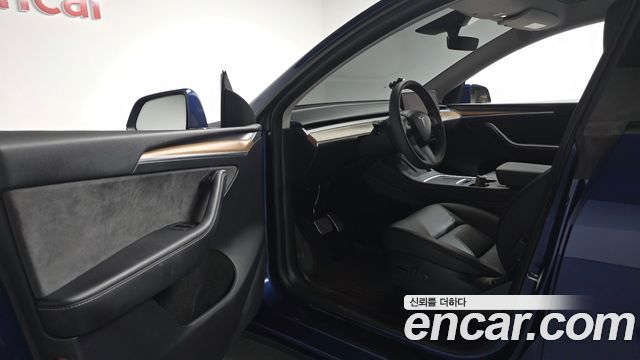 Tesla Model Y 2024 — photo 13