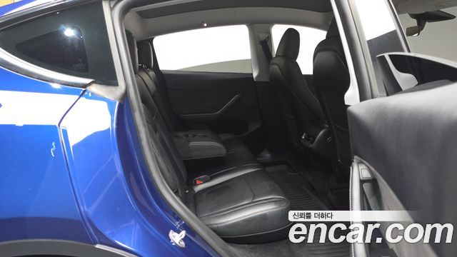 Tesla Model Y 2024 — photo 17