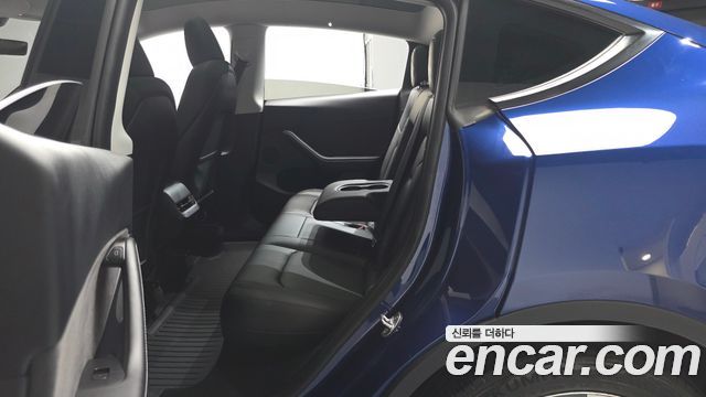 Tesla Model Y 2024 — photo 18