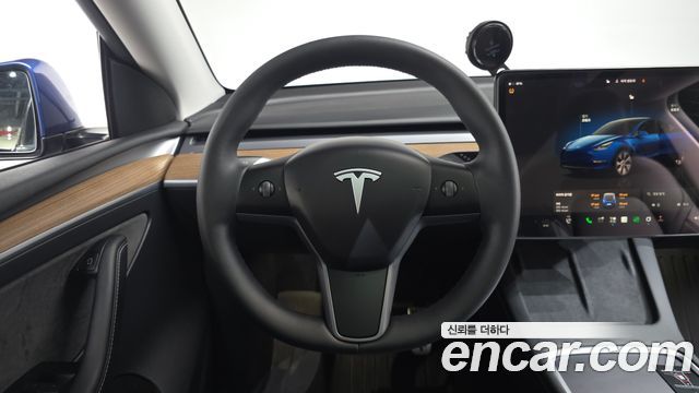 Tesla Model Y 2024 — photo 19