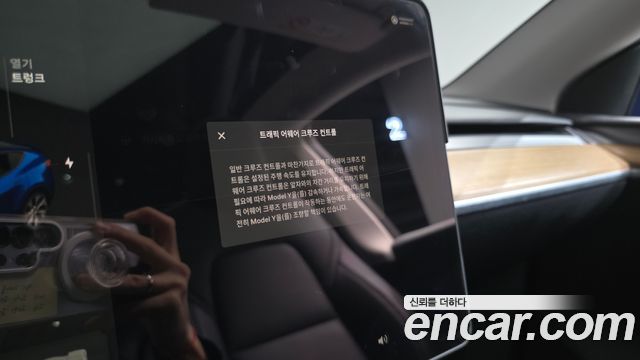 Tesla Model Y 2024 — photo 23