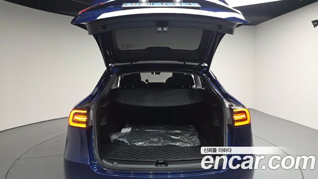 Tesla Model Y 2024 — photo 26
