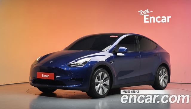 Tesla Model Y 2024 — photo 1