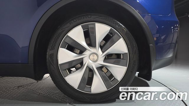 Tesla Model Y 2024 — photo 7