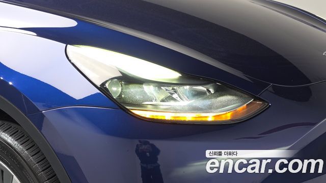Tesla Model Y 2024 — photo 8