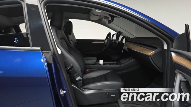 Tesla Model Y 2024 — photo 16