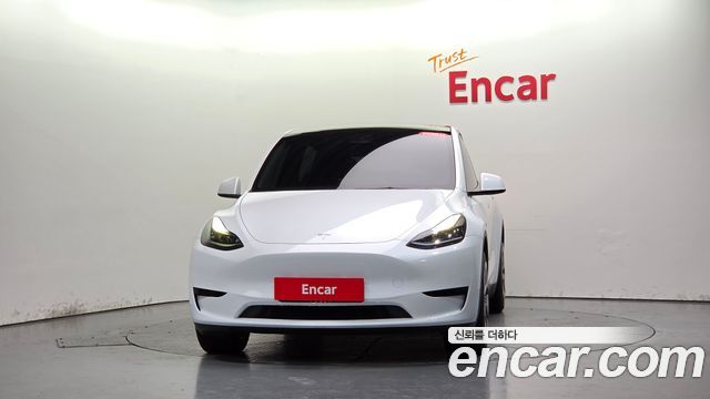 Tesla Model Y 2024 — photo 3