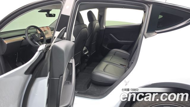 Tesla Model Y 2024 — photo 17
