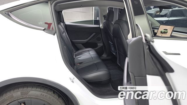 Tesla Model Y 2024 — photo 18