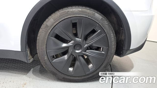 Tesla Model Y 2024 — photo 7