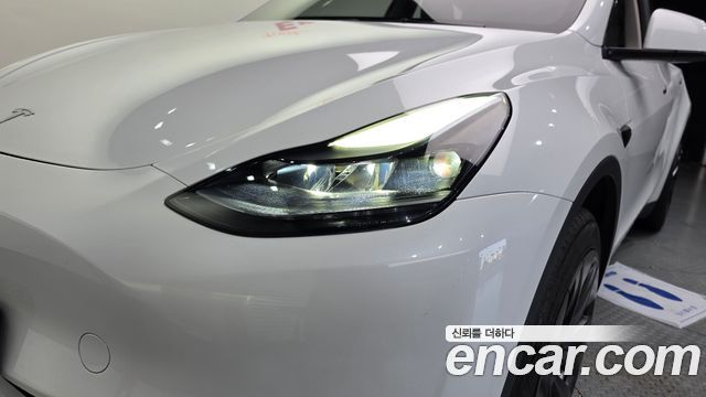 Tesla Model Y 2024 — photo 8