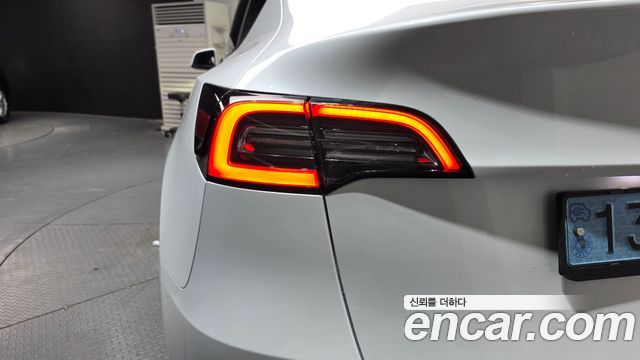 Tesla Model Y 2024 — photo 9