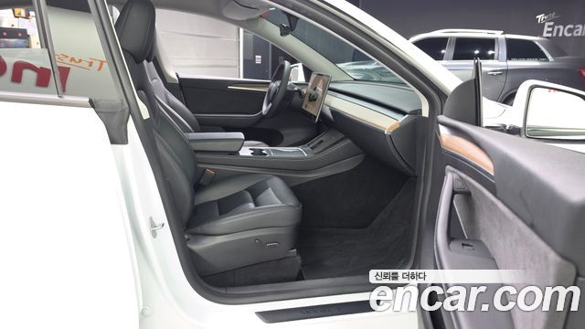 Tesla Model Y 2024 — photo 16