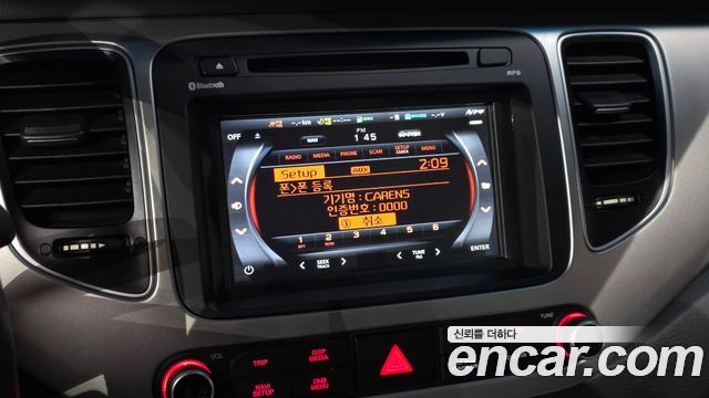 Kia Carens 2015 — photo 27