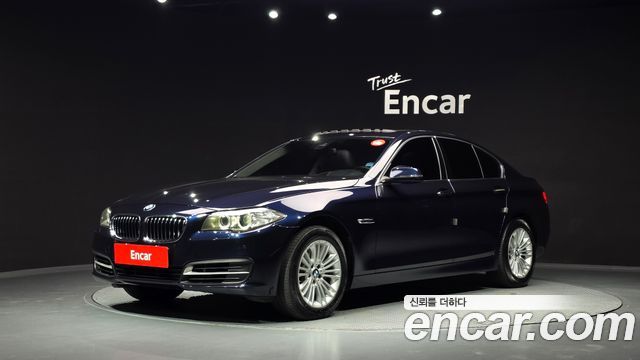BMW 5-Series 2015 — photo 1