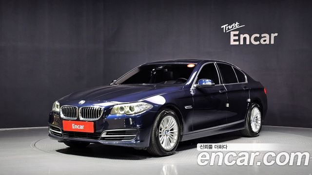 BMW 5-Series 2014 — photo 1