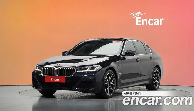 BMW 5-Series 2021 — photo 1