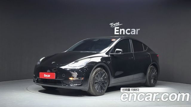 Tesla Model Y 2021 — photo 1