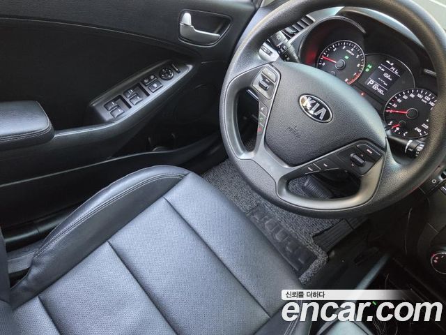 Kia K3 2015 — photo 16