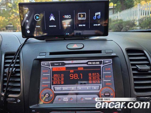 Kia K3 2015 — photo 19