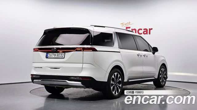 Kia Canival 2021 — photo 2