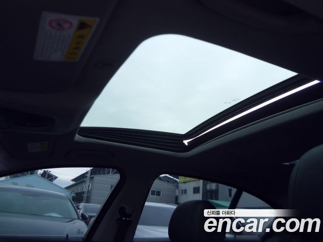 BMW 5-Series 2014 — photo 11