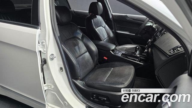Kia K7 2010 — photo 12