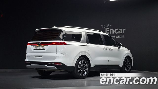 Kia Canival 2023 — photo 2