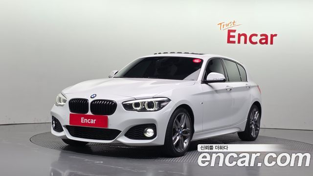 BMW 1-Series 2018 — photo 1