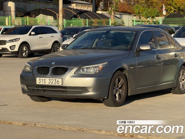 BMW 5-Series 2009 — photo 2