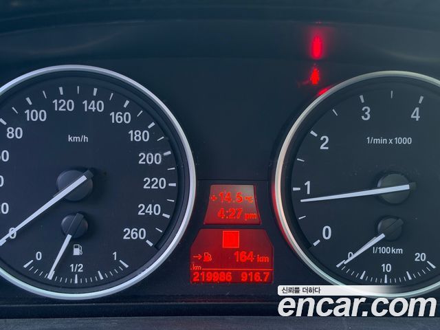 BMW 5-Series 2009 — photo 13