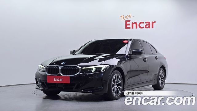 BMW 3-Series 2023 — photo 1