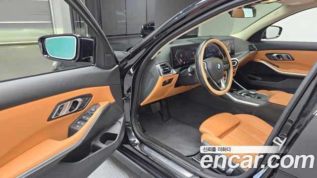 BMW 3-Series 2023 — photo 13