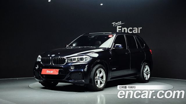 BMW X5 2018 — photo 1