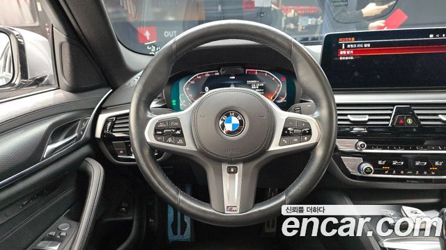 BMW 5-Series 2023 — photo 13