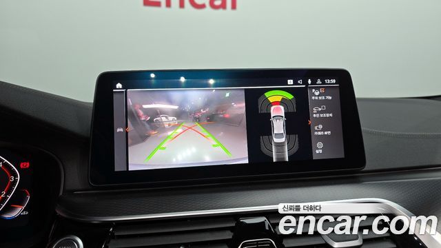 BMW 5-Series 2023 — photo 14