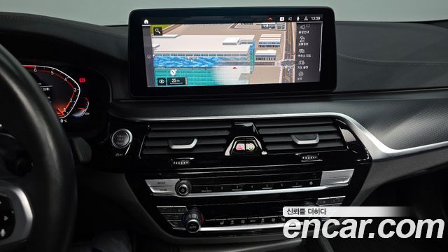 BMW 5-Series 2023 — photo 16