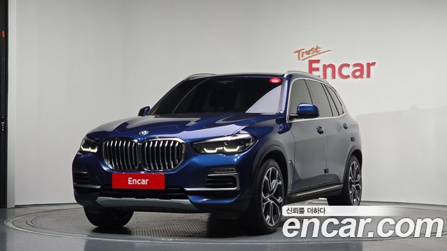 BMW X5 2021 — photo 1