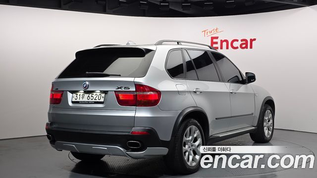 BMW X5 2008 — photo 2