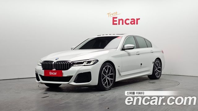 BMW 5-Series 2022 — photo 1